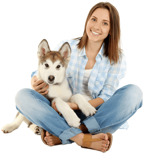smiling woman with puppy