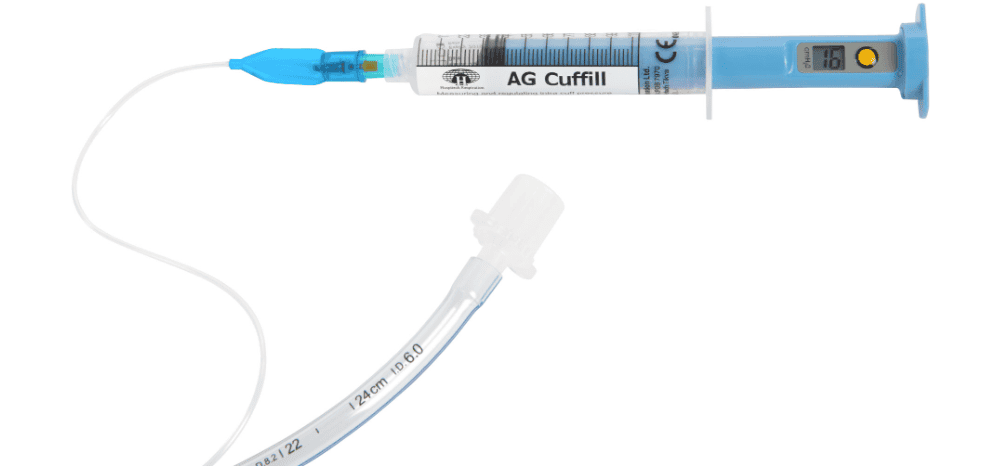 Endotracheal tube and syringe used in veterinary nursing training for intubation procedures.